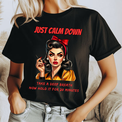 Person wearing a black t-shirt with a graphic design and text.