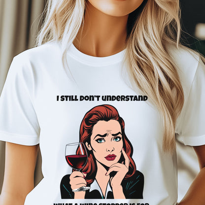 Person wearing a white t-shirt with a graphic of a woman holding a glass of wine and text.